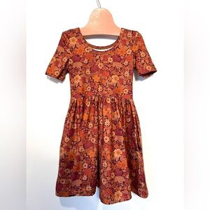 Size 4. Little Stocking Co Floral Neutral Dress.